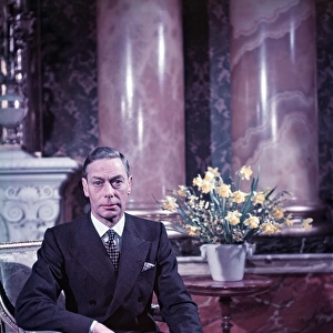 King George VI pictured with flowers