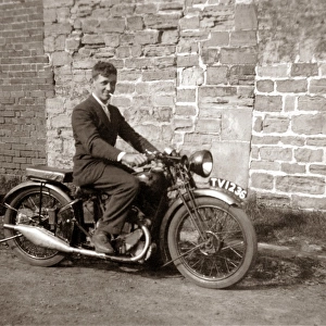 Man sitting on 1929 / 30 BSA motorcycle