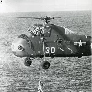 A US Marines helicopter lifts astronaut Virgil ?Gus? Gr?