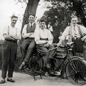 Men pose with 1914 / 15 Triumph motorcycle