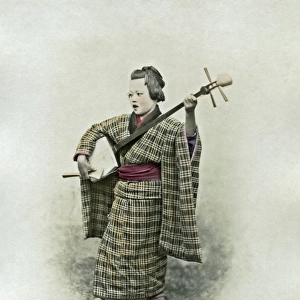 Musician and samisen, Japan