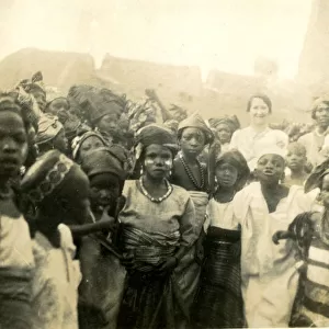 Nurse Mary Henry with the children of the Emir in Lagos