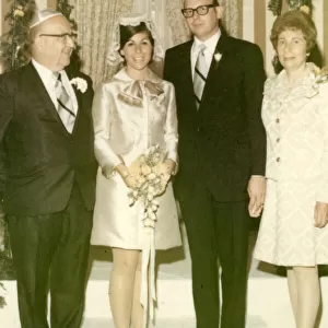 Four people at a Jewish wedding, USA