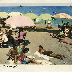 People relaxing on the beach, Pesaro, Italy