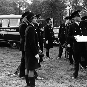 Police officers preparing to conduct a search, London