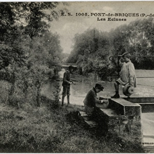 Pont-de-Briques, France - boys on the canal