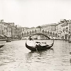 Rialto Bridge and gondola, Venice, Italy
