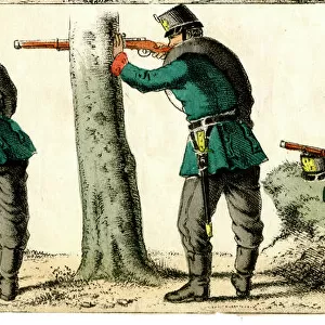 Four riflemen in action
