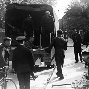 Salvage operation in Victoria Park Road, East London, WW2