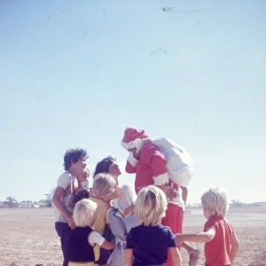 Santa Claus in the desert in Oman with British ex - patriate