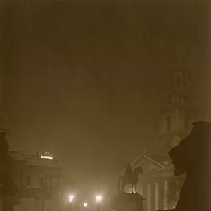 Trafalgar Square, London on a foggy night