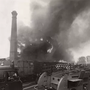 Warehouse on fire near railway line