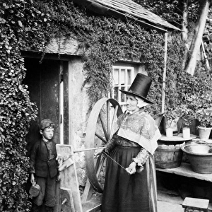 Welsh woman with spinning wheel, Wales