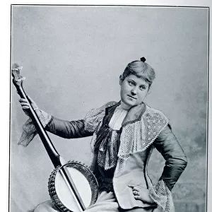 Woman posing with banjo