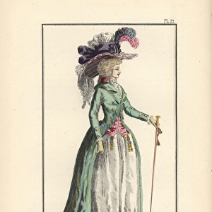 Woman in a silk redingote and straw hat with