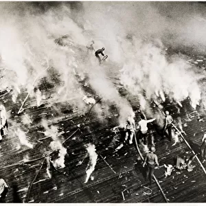 WW II - crew of USS Intrepid aircraft carrier put out fires