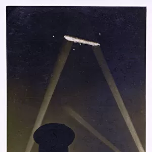 WW1 - Zeppelin over the UK illuminated by searchlights