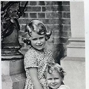 York Roses, Princesses Elizabeth and Margaret, informal outdoor photograph by a pillar. With description, York Roses; Princess Elizabeth and Princess Margaret, the daughters of the Duke and Duchess of York
