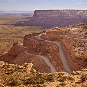 Mokey Dugway - view onto the switchbacks of gravel road UT261, carved into the flanks of the cliff. UT 261 is descending the plateau of Cedar Mesa, view from a place called Mokey Dugway - Cedar Mesa, Utah, USA