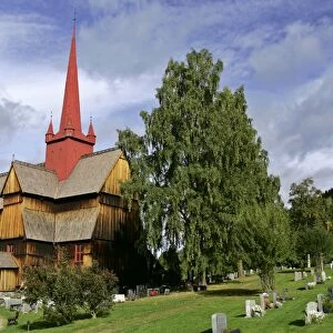 Stave church of Ringebu with cemetry in early autumn municipality of Ringebu, Gudbrandsdalen, Oppland, Norway