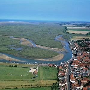 UK - aerial of Wells-next-the-sea, salt marsh landscape & coastline at low tide. Norfolk, UK