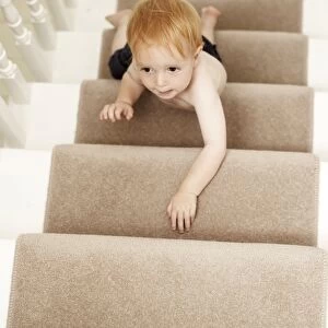 Boy climbing stairs