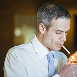 Man lighting a cigarette