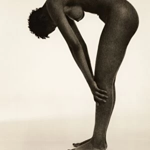 Naked woman bending over