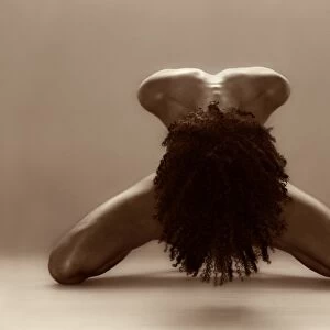 Naked woman bowing