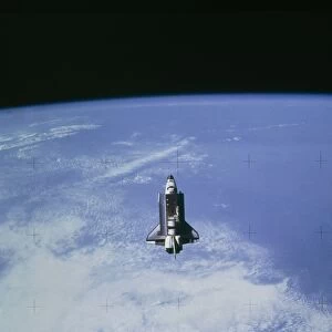 Space shuttle Challenger STS-7 orbiting Earth