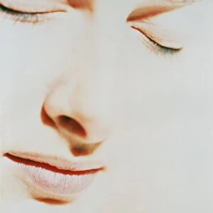 Womans face with closed eyes