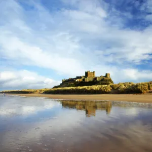 England, Northumberland, Bamburgh Castle. Bamburgh Castle and dunes near Bamburgh village