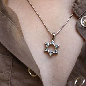 A 10-year-old girl wearing Star of David jewelry, Hertzliya, Israel, Middle East