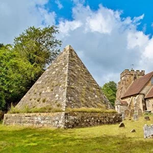 The 19th century pyramid under which the former local MP Mad Jack Fuller is buried in Brightling churchyard, East Sussex, England, United Kingdom, Europe