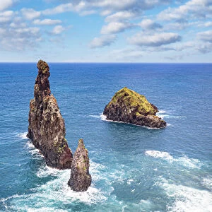 Aerial view of rock formation Ilheus da Rib and Ribeira da Janela in the rough ocean