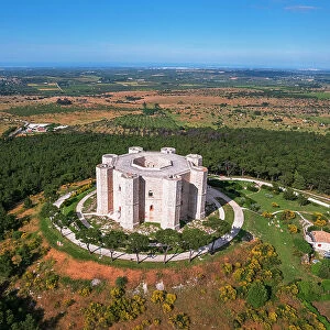 Aerial view of the white octagonal castle of Castel del Monte rising in the middle of the countryside, UNESCO World Heritage Site, Apulia, Italy, Europe