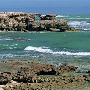 Arches left by rapid erosion at Nora Creina Bay on the coastline northwest of Beachport in the southeast of South Australia