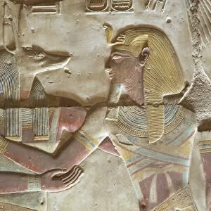 Bas-relief of the God Anubis on left, with the Pharaoh Seti I, Temple of Seti I, Abydos