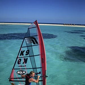 British Windsurfing Champion Guy Cribb in calm waters of the Red Sea, Egypt