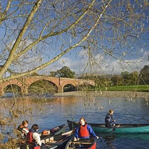 Canoeists on the River Eden at Eden Bridge, Lazonby, Eden Valley, Cumbria