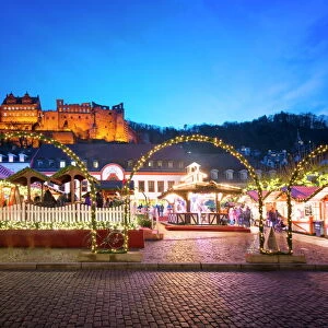 Christmas Market at Karlsplatz in the old town of Heidelberg, with Castle Heidelberg, Heidelberg, Baden-Wurttemberg, Germany, Europe