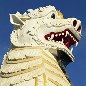 Close-up of the huge lion statue (chinthe), at the foot of the stairs to Mandalay Hill