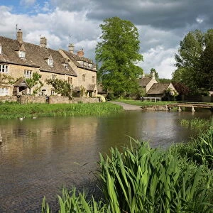 Cotswold stone cottages on the River Eye, Lower Slaughter, Cotswolds, Gloucestershire, England, United Kingdom, Europe