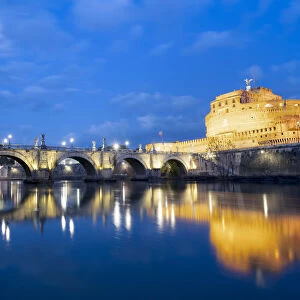 Dusk over Castel Sant Angelo and bridge over River Tiber, UNESCO World Heritage Site