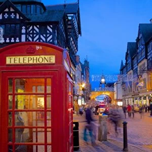 East Gate and telephone box at Christmas, Chester, Cheshire, England, United Kingdom, Europe