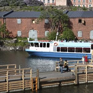 Ferry from Helsinki with Museum and Visitors Centre in the background, Suomenlinna Island