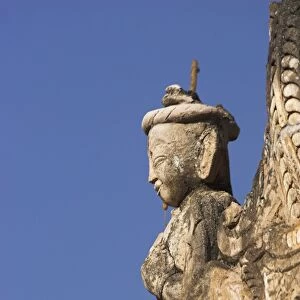 Figure on one of the ancient stupas, Kakku Buddhist Ruins, a site of over two thousand brick