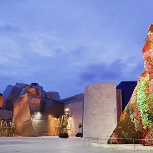 The Guggenheim, designed by architect Frank Gehry, and Puppy, the dog flower sculpture by Jeff