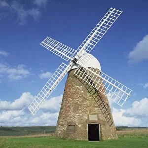 Halnaker Windmill, a restored 18th century brick tower mill, on top of Halnaker Hill in South Downs