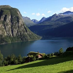 A house above the fjord at Valldal, Norway, Scandinavia, Europe